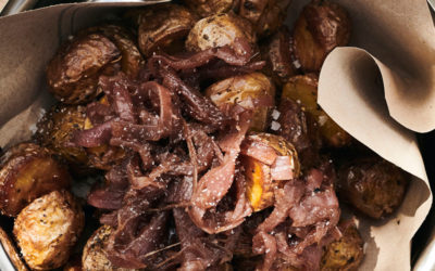 Roast potatoes with onion confit & truffle salt
