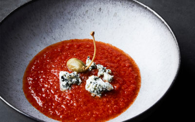 Tomato soup with olives, capers and blue cheese